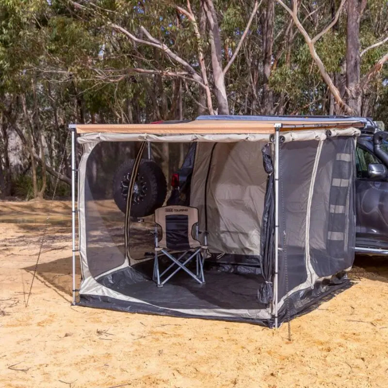 ARB Deluxe Awning Room Including Floor Netting Only With Chair Inside