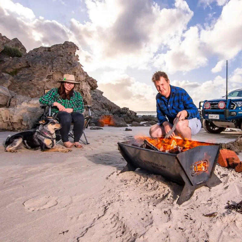 ARB Fire Pit Corten Weather Steel In Use With Couple