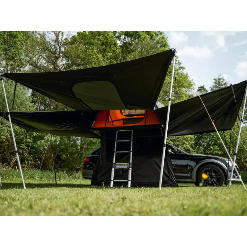 TentBox Lite XL Living Pod Setup With TentBox on Car all sides open View From Lower Down on the Ground