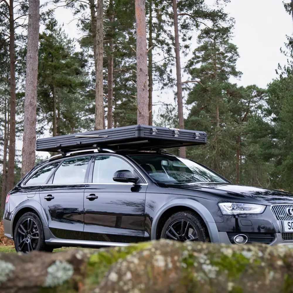 side view of the cargo 2.0 packed away on to of car